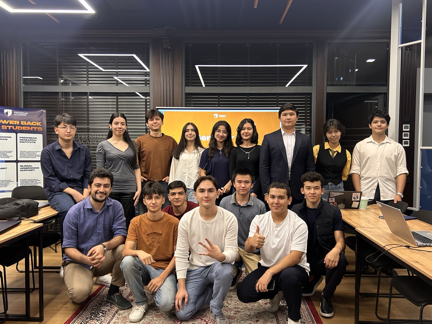 Freshman students posing together in the office